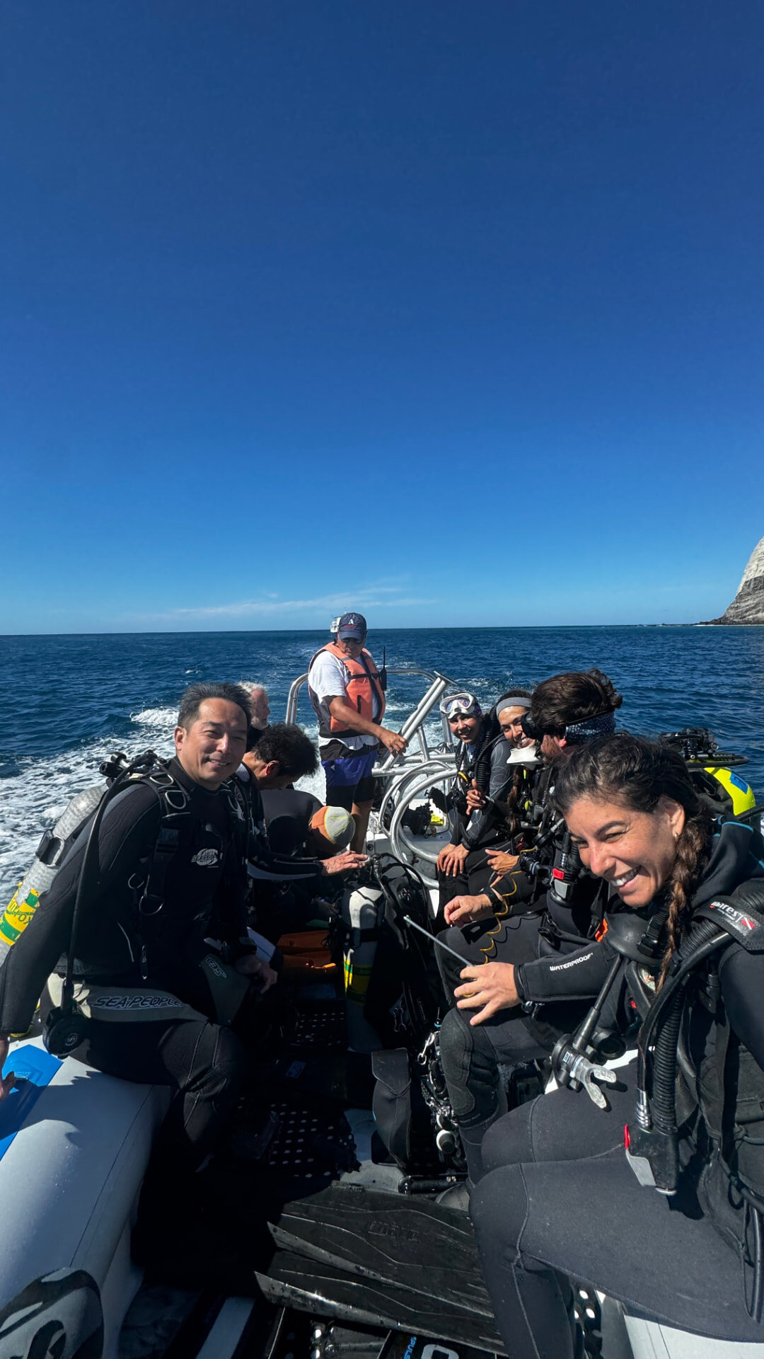 Kimber Greenwood with fellow divers aboard a dive boat in Mexico