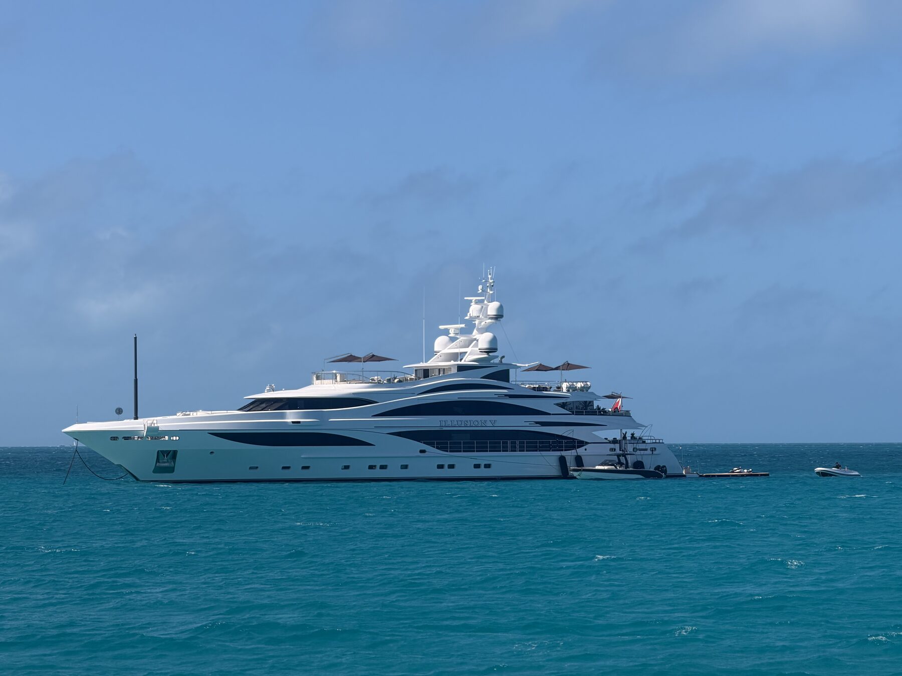 Luxury liveaboard yacht anchored in clear blue water