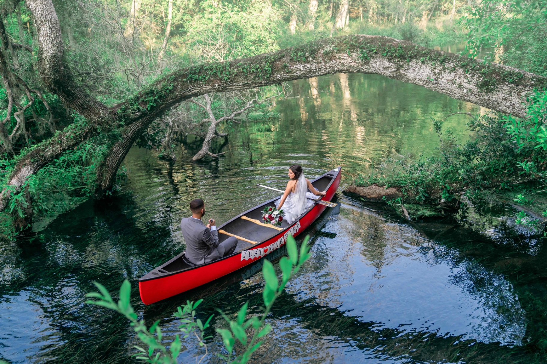 Couple in canoe on spring waters