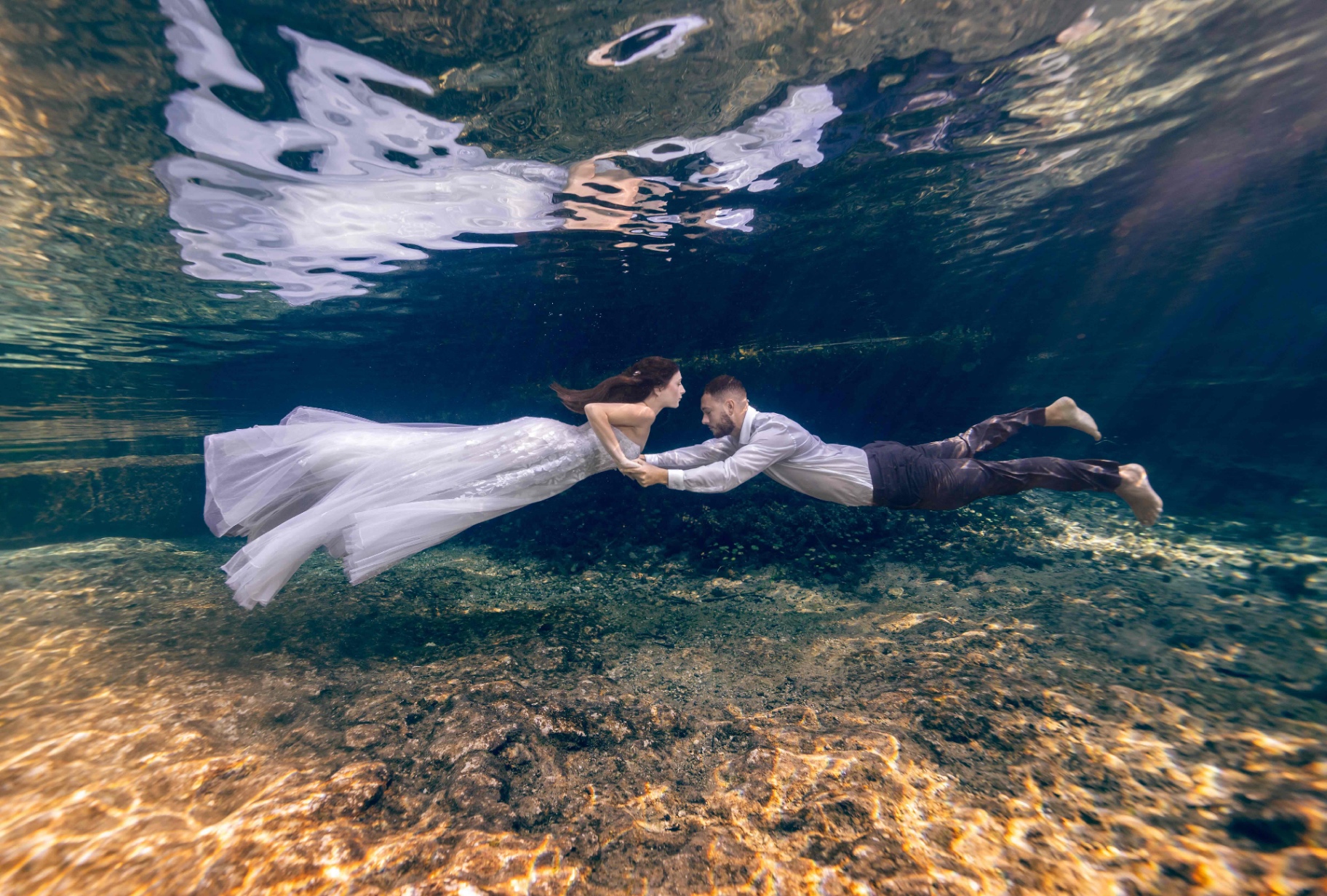 Underwater elopement couple portrait