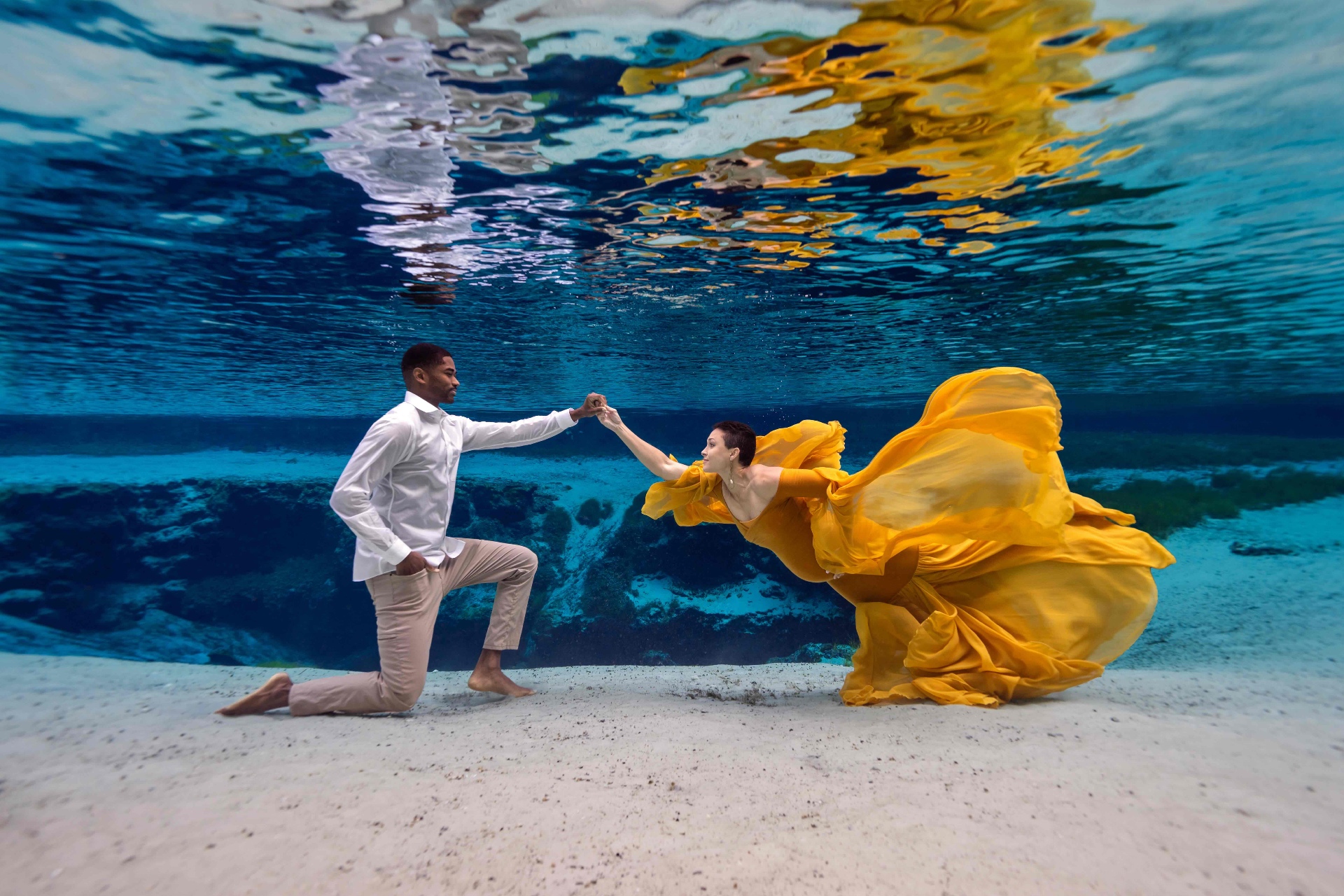 Underwater portrait in yellow