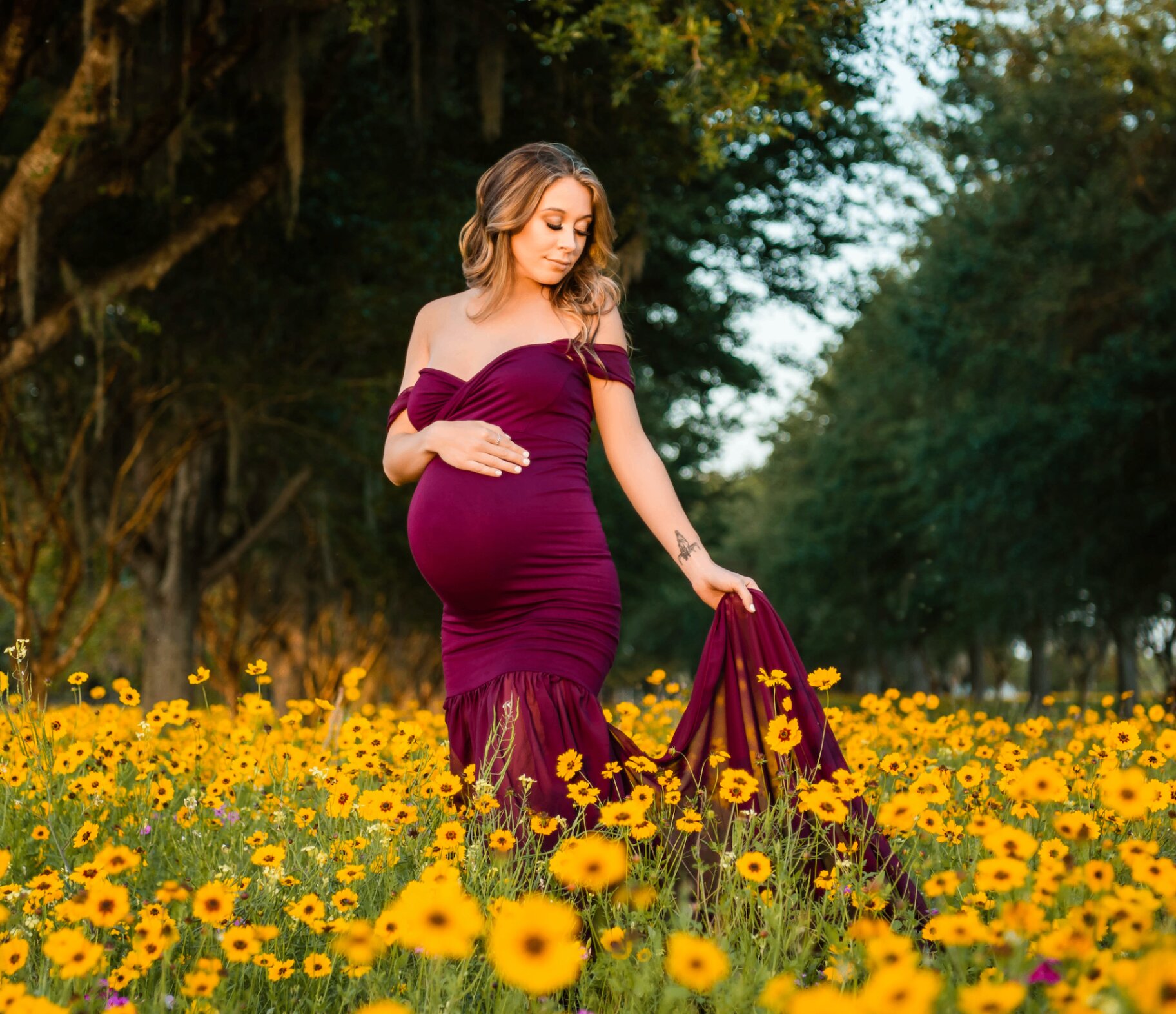 Maternity photography in flower field